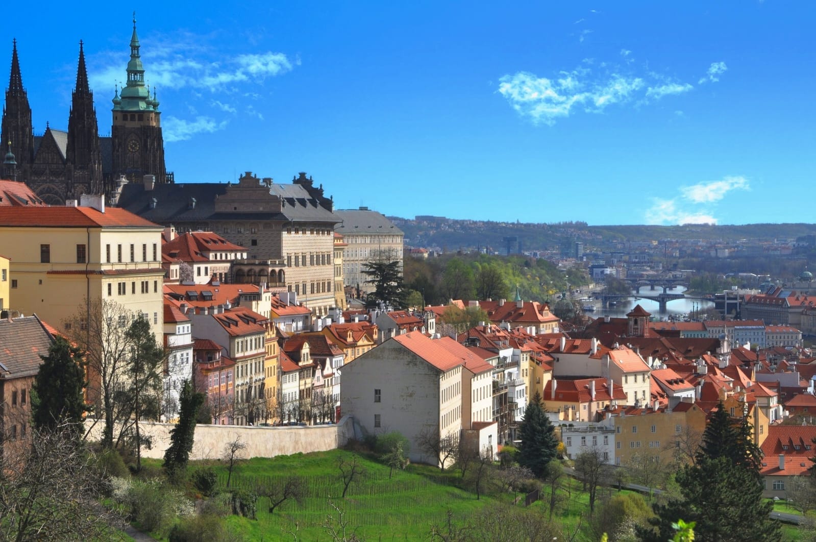 Riverside view towards Prague Castle during a private city tour